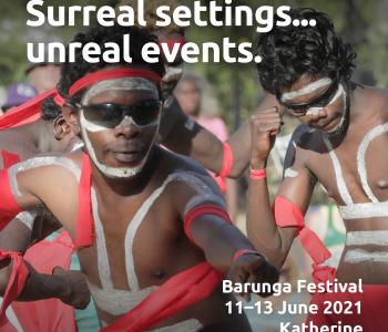 Aboriginals men in ceremonial dress dancing