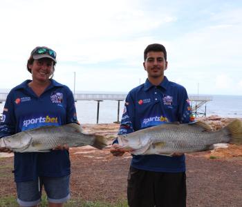 Winning fishos Tracy Coughlan and Manolis Zaroufis