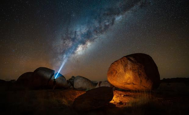 Star gazer looking up at the night sky at Karlu Karlu / Devils Marbles Conservation Reserve