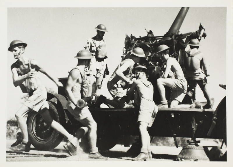 WWII Soldiers man a gun in Darwin